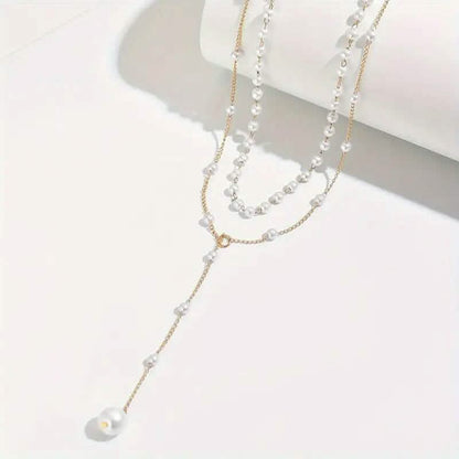 Elegant Vintage Style Double-Layer Pendant Necklace with Imitation Pearl Accents and Tassel Drop